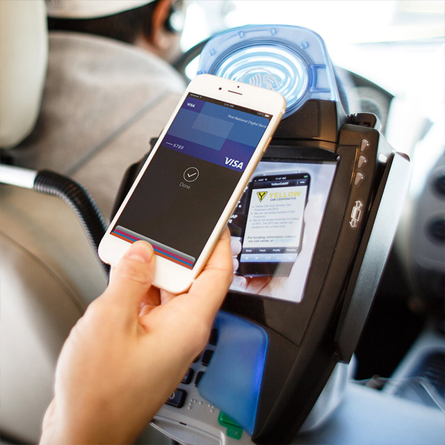 making payment in the taxi with phone